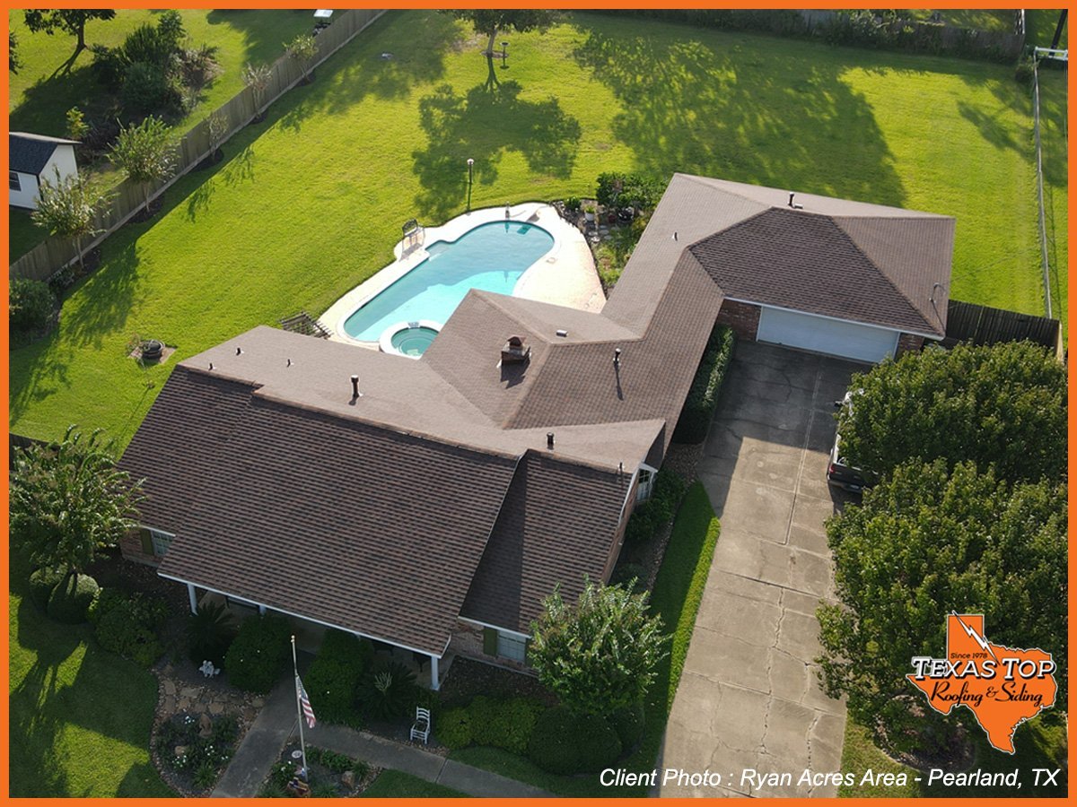 Aerial view of residential home with swimming pool